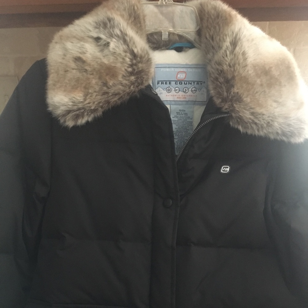 Woman’s black puffer